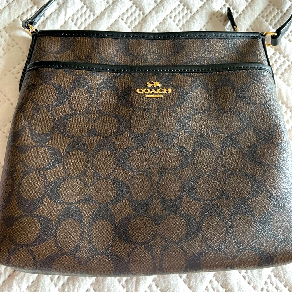 Coach dark brown with black lettering ..great condition .